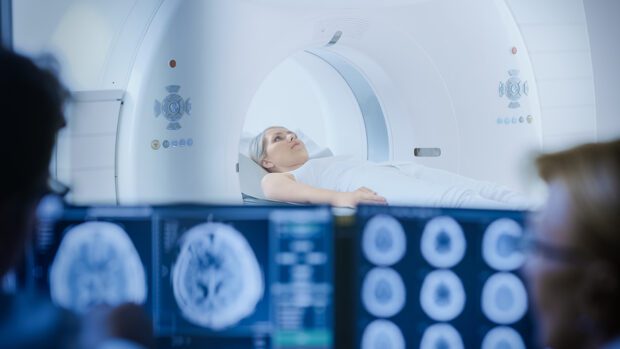 Woman in CT scanner